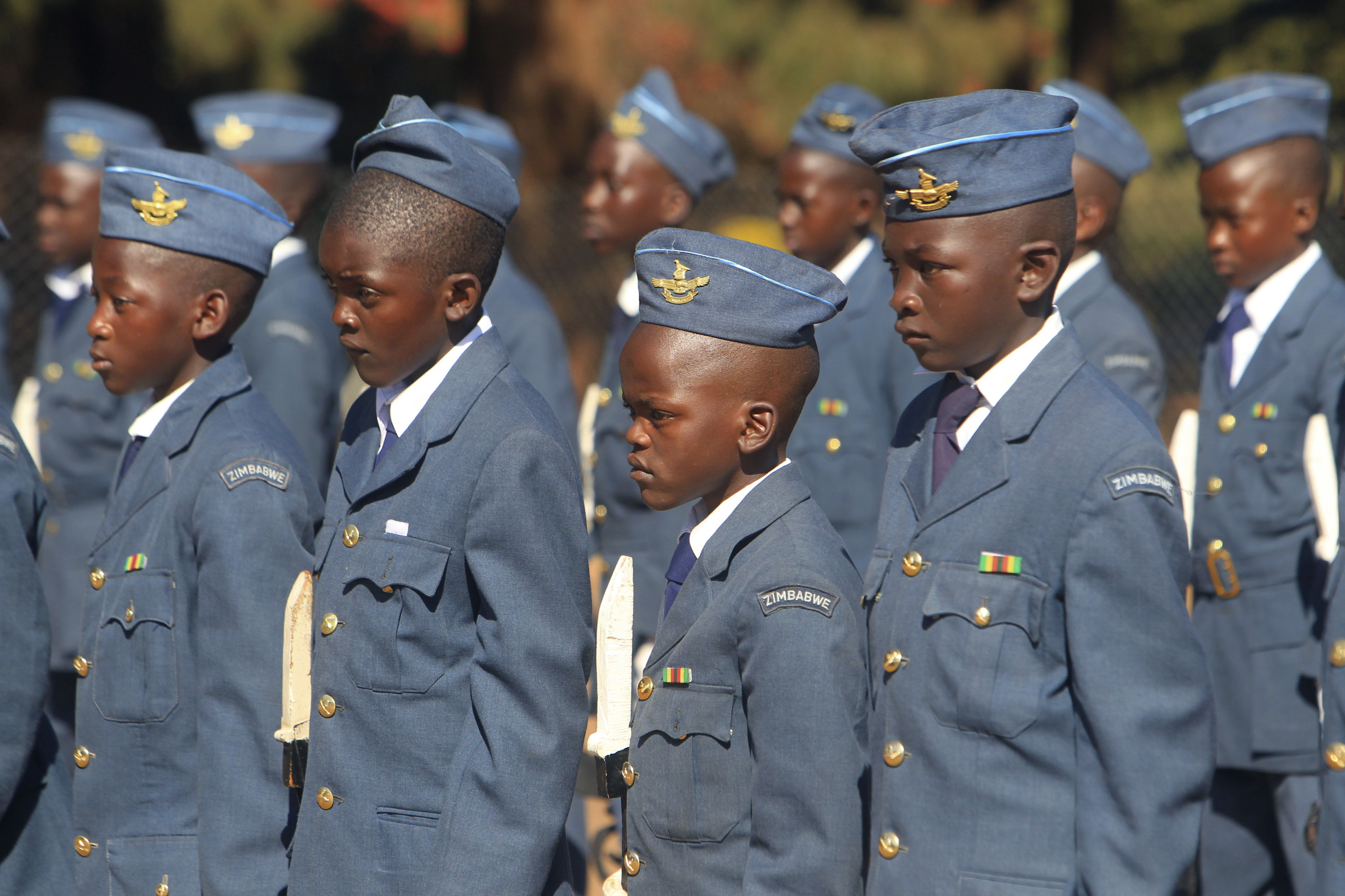 In this June 16, 2018, photo, boys dressed in Air Force uniforms stand during celebrations to mark the Day of the African Child in Harare, Zimbabwe. Day of the African Child is celebrated on June 16 every year to commemorate the 1976 uprising in Soweto, South Africa. (AP/Tsvangirayi Mukwazhi)