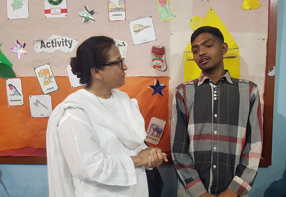 St. Joseph of Chambery Sr. Shakila Bhatti with 17-year-old Irfan Manzoor, a Christian teen and student at Soar Primary School in Lahore, Pakistan (GSR photo/Kamran Chaudhry)