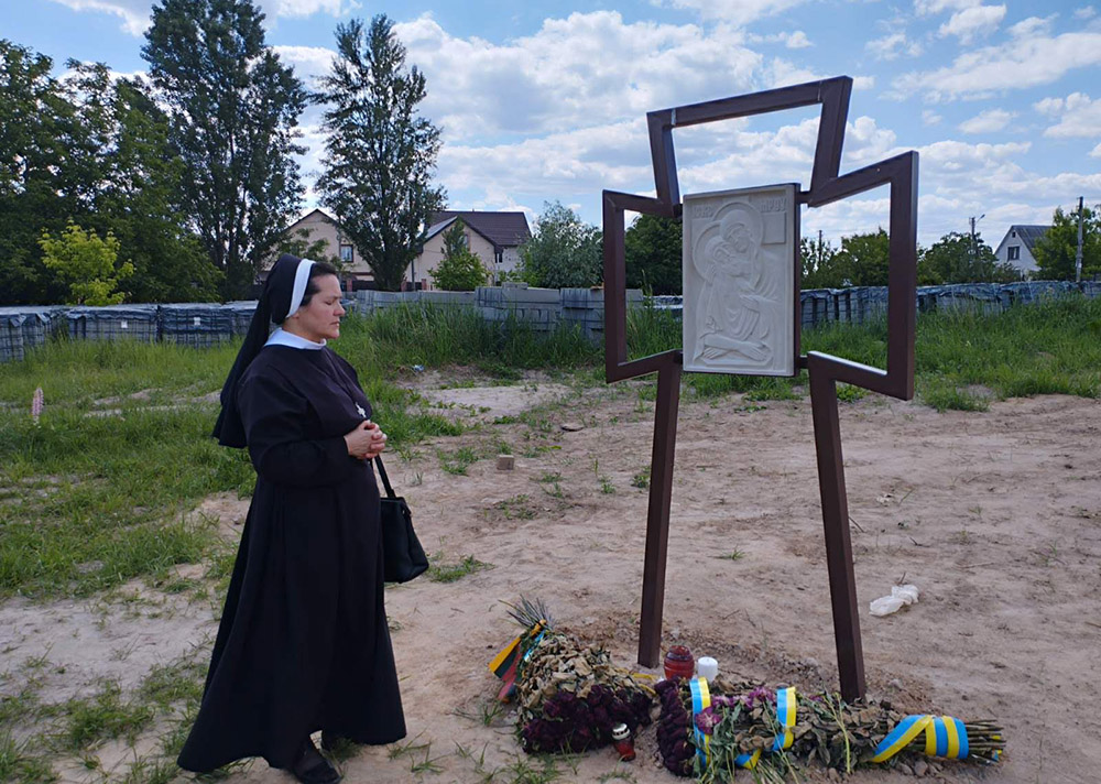 Basilian Sr. Januarija Isyk prays in Bucha, Ukraine. (Courtesy of Sisters of the Order of Saint Basil the Great)