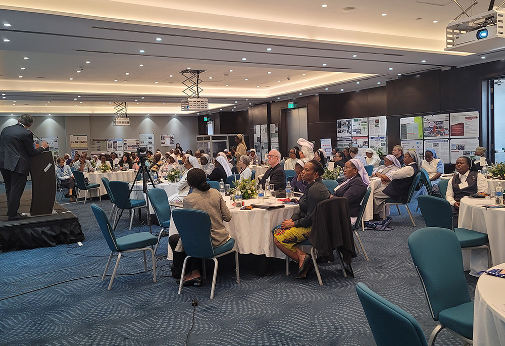 Participants in the Conrad N. Hilton Foundation global convening gather Oct. 27 in small groups for a brainstorming exercise on the importance of gathering, analyzing and using data. (GSR photo/Gail DeGeorge)