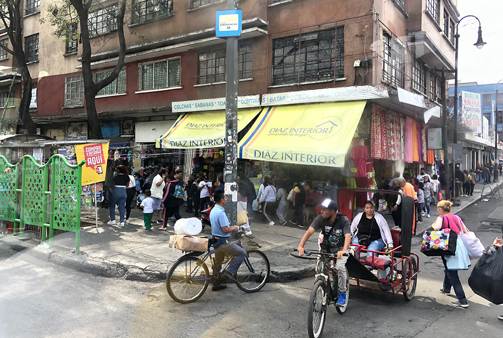 Traffic of all kinds is used to get around in La Merced, such as this rickshaw-like bicycle designed for carrying passengers and merchandise. (GSR photo/Tracy Barnett)