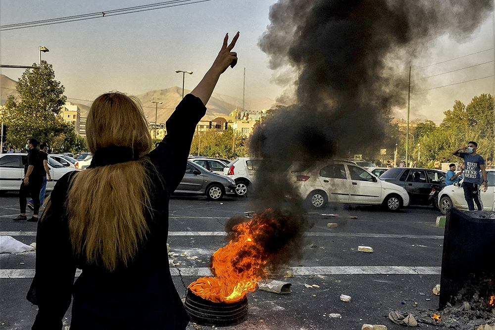 Iranians protest Oct. 1 in Tehran after the September death of 22-year-old Mahsa Amini after she was detained by Iranian "morality police." (AP/Middle East Images)