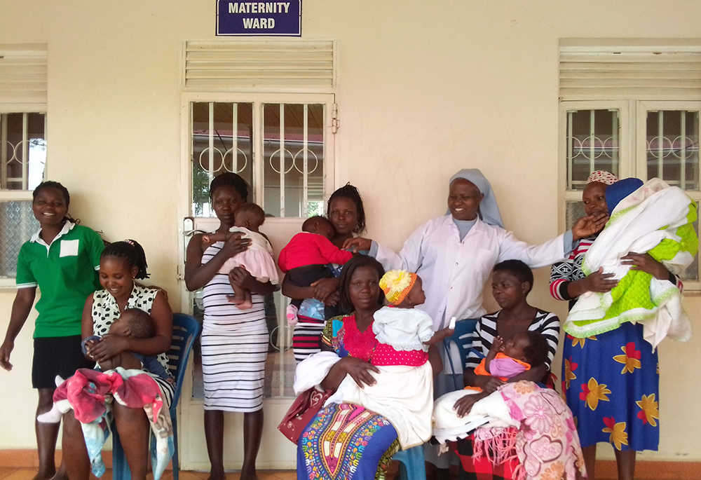 Sr. Jane Frances Kabagaaju is pictured with some of the patients served by the Nkuruba Health Centre. The center received a $25,000 grant as the award for her completion and successful presentation as part of the Builders of Africa’s Future award. The money will be used to address maternal health and newborn babies. (Courtesy of Sr. Jane Frances Kabagaaju)