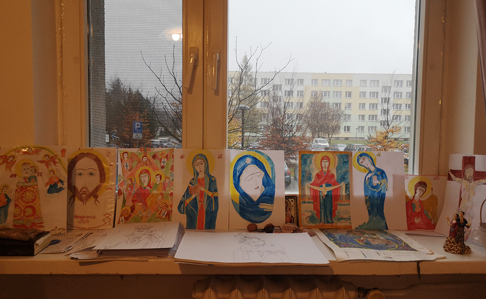 Icon work by Irena Atamaniuk in her Warsaw dormitory apartment. She is taking a course on iconography from Sr. Nazaria Mykhayliuk, a Ukrainian sister of the Order of St. Basil the Great. (Courtesy of Irena Atamaniuk)