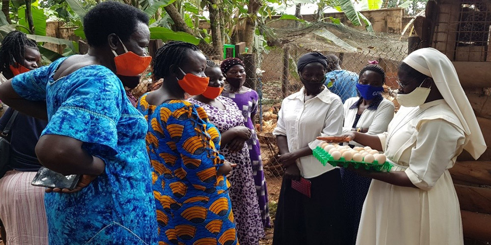 Sr. Rose Thumitho teaches women how to arrange eggs. (Courtesy of Sr. Rose Thumitho)