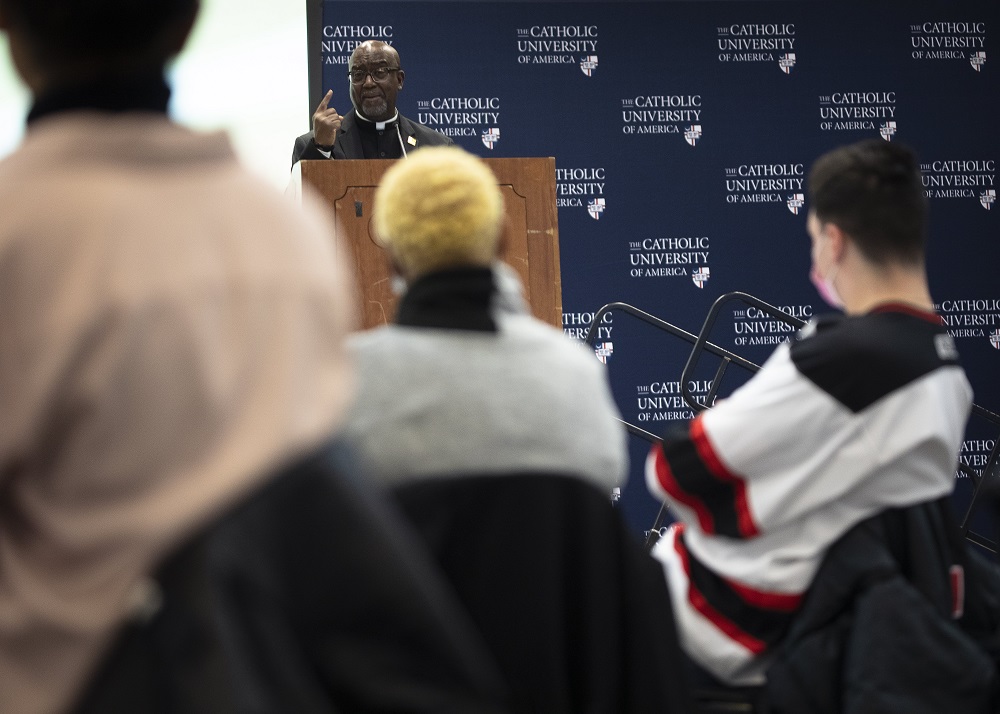 Fr. Manuel Williams speaks during a Feb. 15 luncheon at the Catholic University of America in Washington about the contemporary tea
