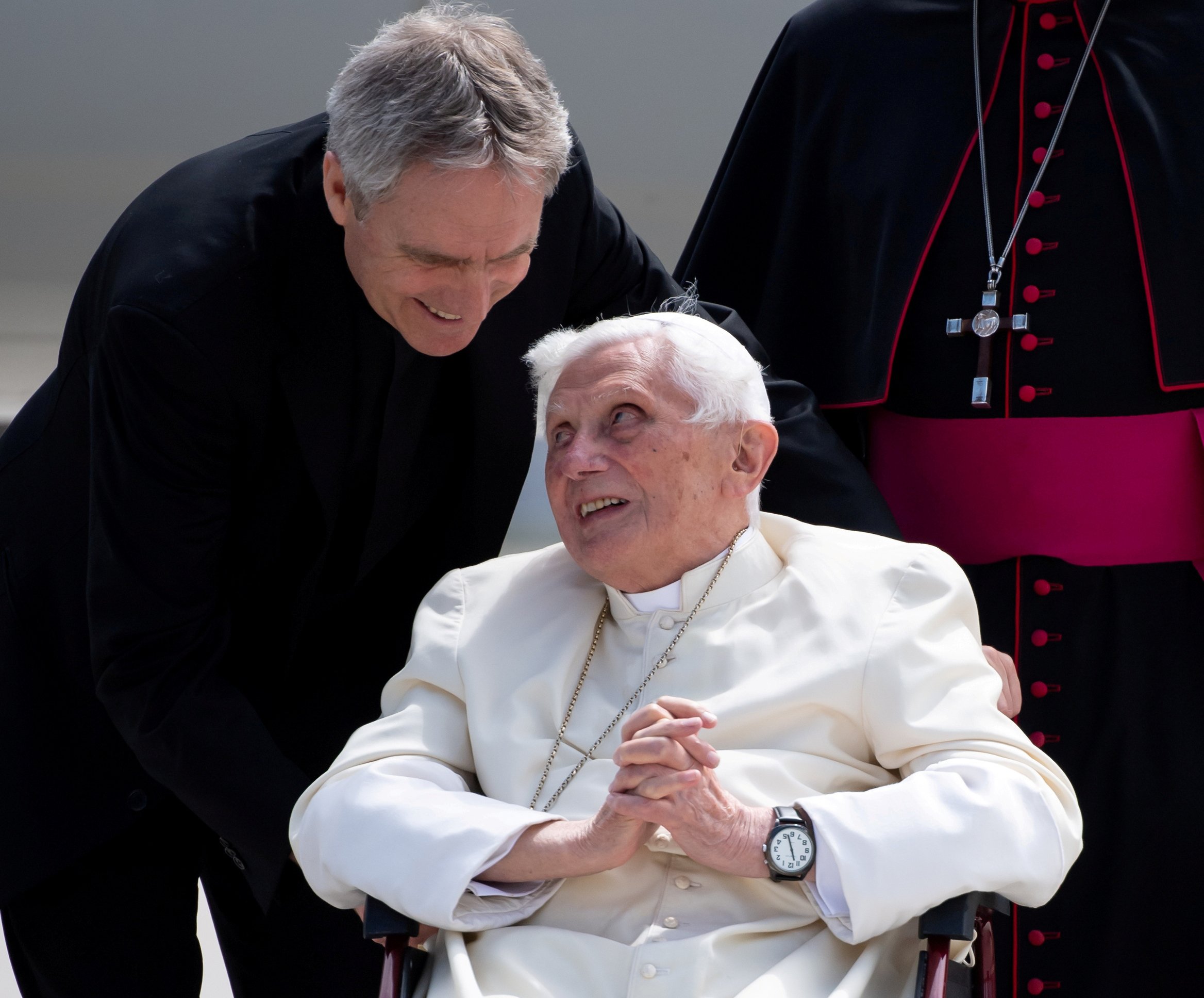 Retired Pope Benedict XVI speaks to his private secretary, Archbishop Georg Gänswein, at Germany's Munich Airport before his departure to Rome June 22, 2020. (CNS photo/Sven Hoppe, pool via Reuters)