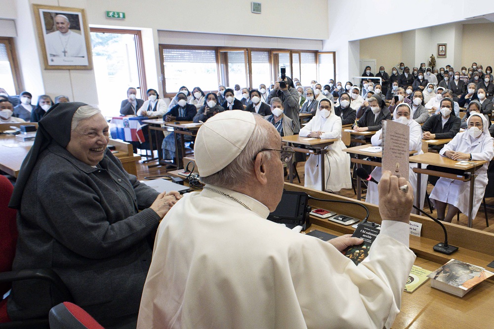 Sr. Yvonne Reungoat, the newest member of the Dicastery for Bishops, is pictured with Pope Francis during an Oct. 22, 2021, meeting with members of the order in Rome. (CNS/Vatican Media)