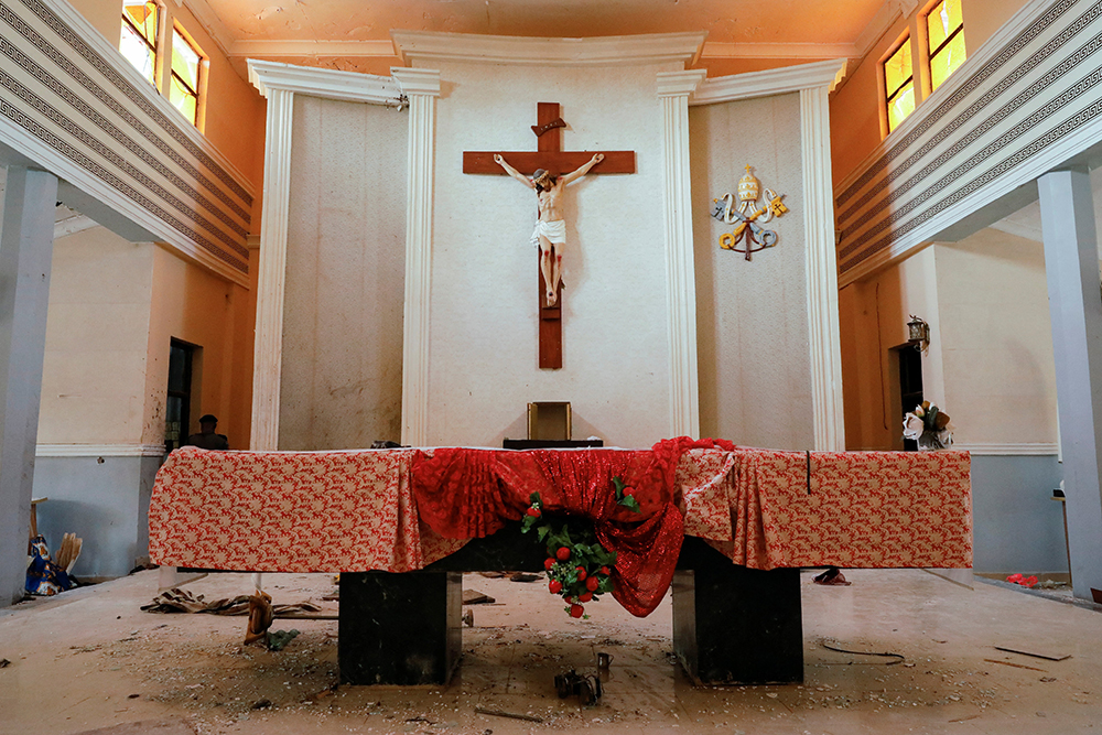 The altar of St. Francis Xavier Church in Owo, Nigeria, on June 5, the day after gunmen attacked worshippers. In August, Nigerian officials identified six suspects arrested in connection with the attack that killed 40 people. (CNS/Reuters/Temilade Adelaja