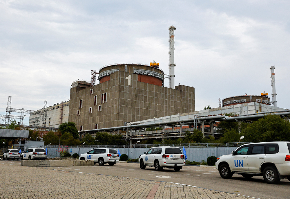 A motorcade transporting the International Atomic Energy Agency expert mission arrives at the Zaporizhzhia Nuclear Power Plant on Sept. 1 in the course of Ukraine-Russia conflict outside the Russian-controlled city of Enerhodar in eastern Ukraine. (CNS/Re