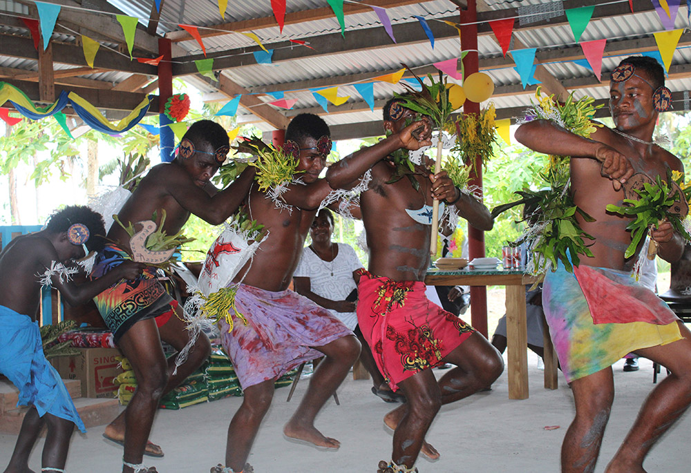 Students dance during the November 2021 graduation in the school community hall at San Isidro Centre. (Courtesy of Maria Fe Rollo) 