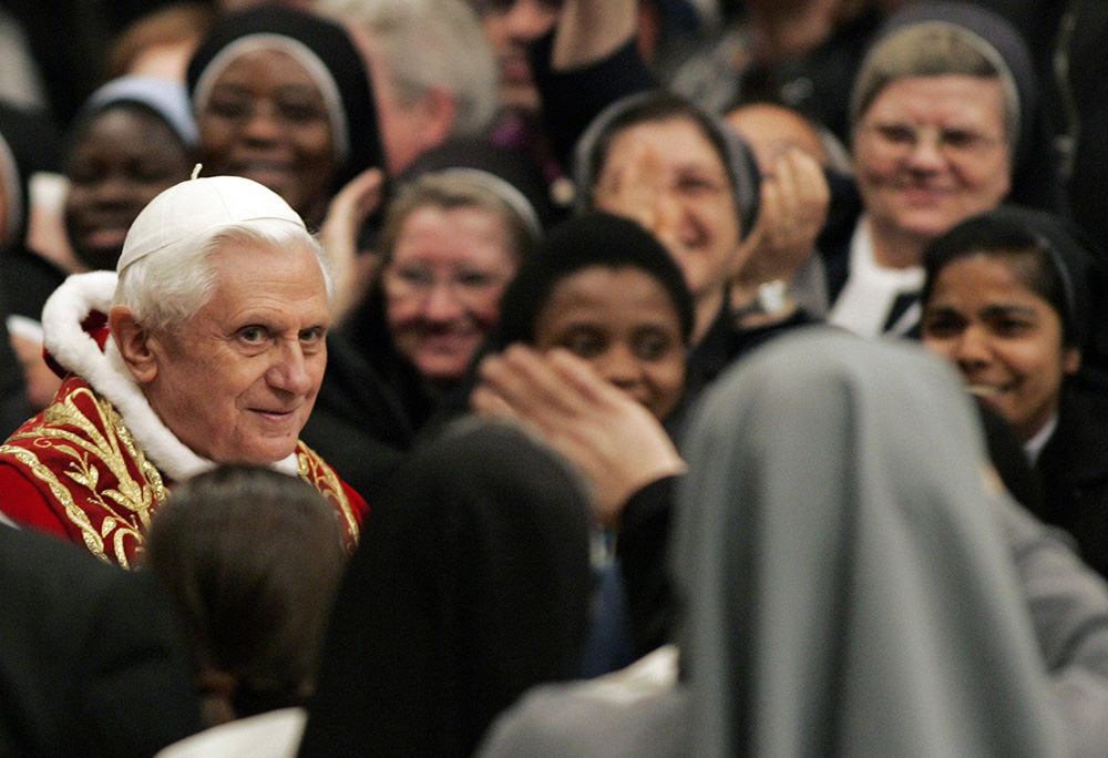 Pope Benedict XVI greets nuns as he arrives for a special Mass for consecrated men and women Feb. 2, 2007, in St. Peter's Basilica at the Vatican. (CNS/Reuters/Dario Pignatelli)
