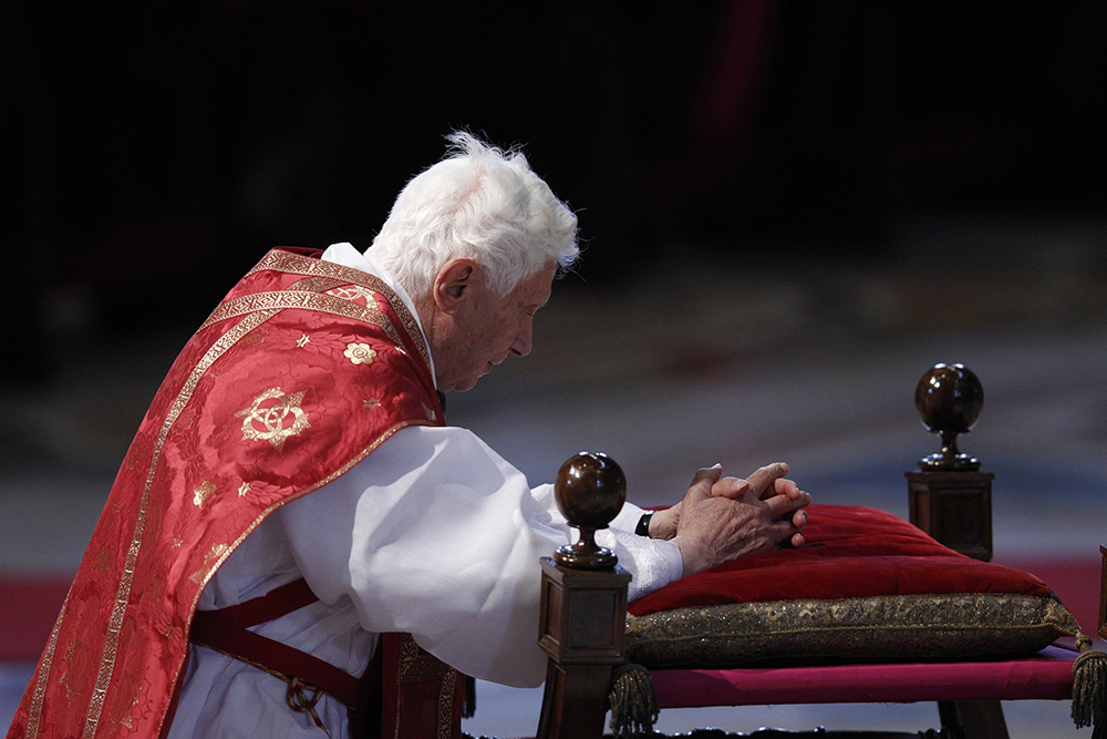 Pope Benedict XVI prays as he leads Good Friday service April 6, 2011, in St. Peter's Basilica at the Vatican. (CNS/Paul Haring)