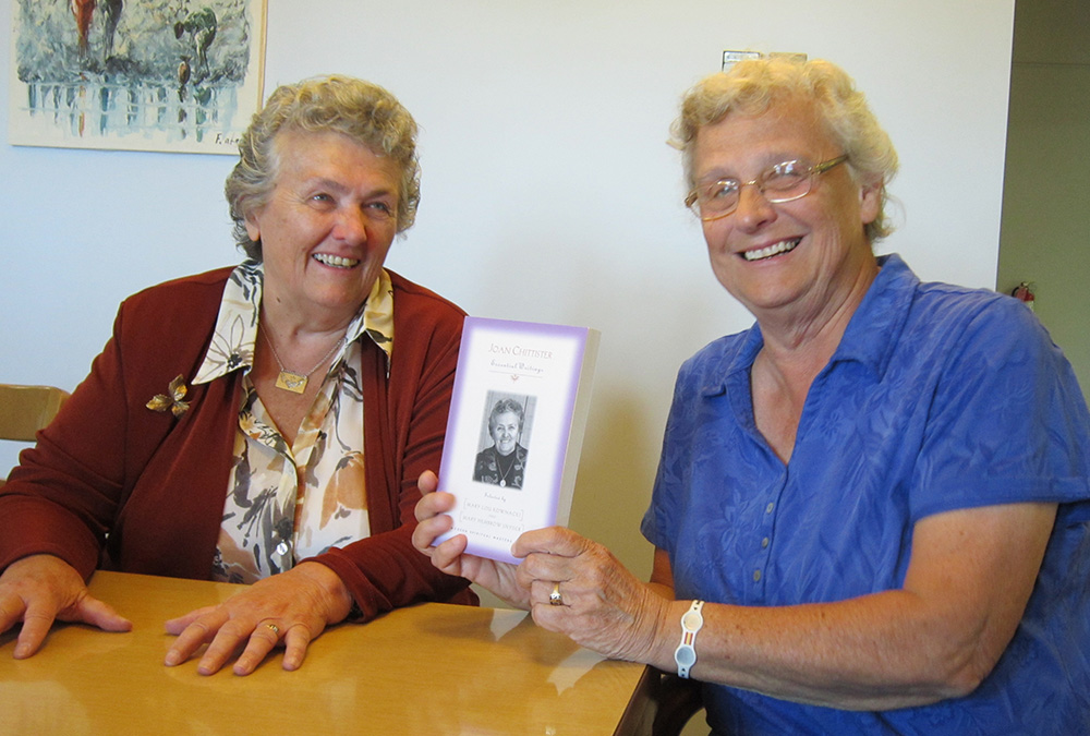 Benedictine Sr. Joan Chittister, left, and Benedictine Sr. Mary Lou Kownacki in July 2014 at the release of the book Joan Chittister: Essential Writings (Orbis), which Kownacki co-edited (Courtesy of Benedictine Sisters of Erie)