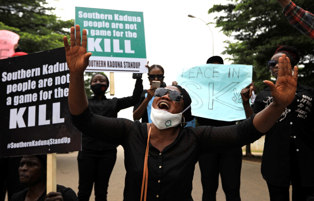 A woman reacts during a protest in Abuja, Nigeria, Aug. 15, 2020. The demonstration was against the continued killings in southern Kaduna and insecurities in Nigeria. Deadly violence hit Christians in Africa Jan. 15, 2023, with a Catholic priest in northern Nigeria burned to death and as many as 17 Christians killed in a blast in eastern Democratic Republic of Congo. (OSV News photo/Afolabi Sotunde, Reuters)