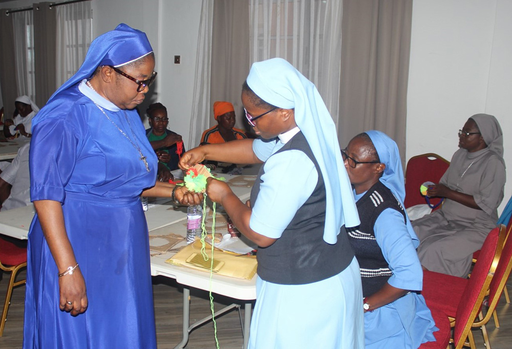 Sister participants make toys at the SCORE ECD June training workshop in Tamale, Ghana. (Courtesy of Francis Monnie)