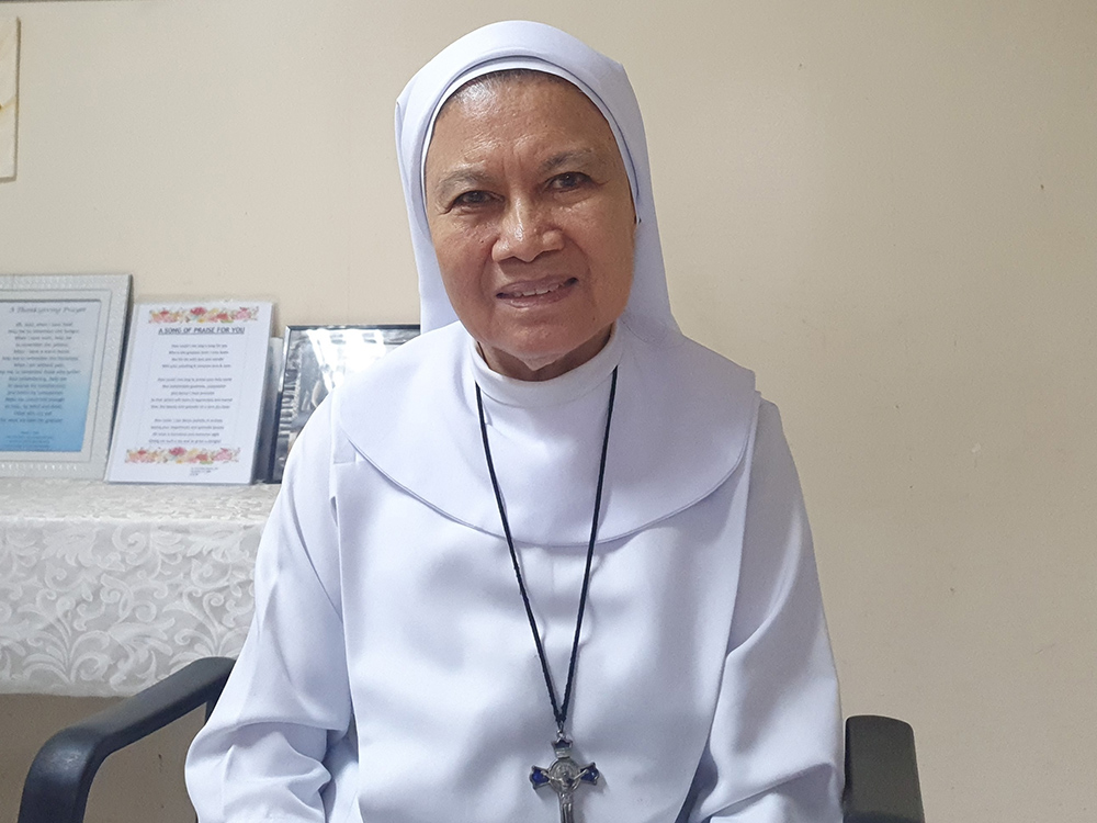 Sr. Eva Fidela Maamo, a member of Sisters of St. Paul de Chartres, in the conference room at the Foundation of Our Lady of Peace Mission in Paranaque City, Philippines (Oliver Samson)