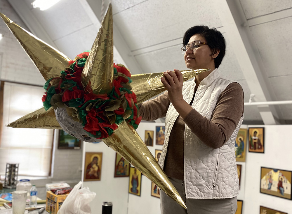 Sr. Helga Leija works on her piñata for Epiphany. (Courtesy of Helga Leija)