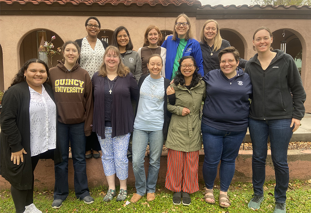 Members of Giving Voice attend the group's 2023 20s & 30s Retreat at Our Lady of Guadalupe Monastery in Phoenix, Arizona. Eilis McCulloh is pictured in the front row, second from the right. (Courtesy of Eilis McCulloh)
