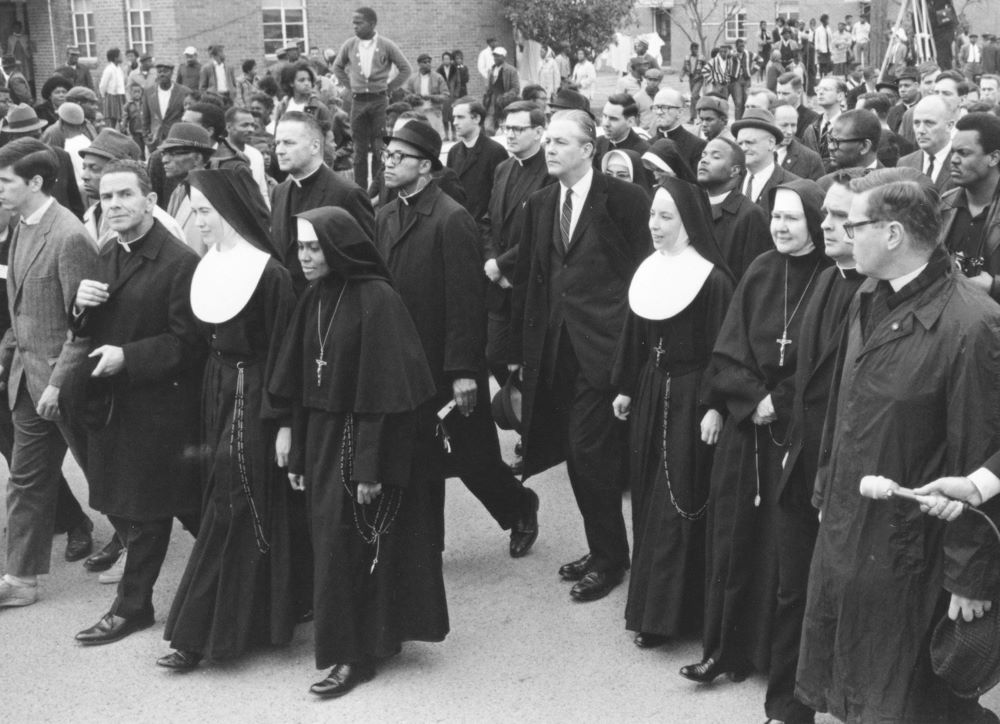 Sisters marching in 1965 Selma protest