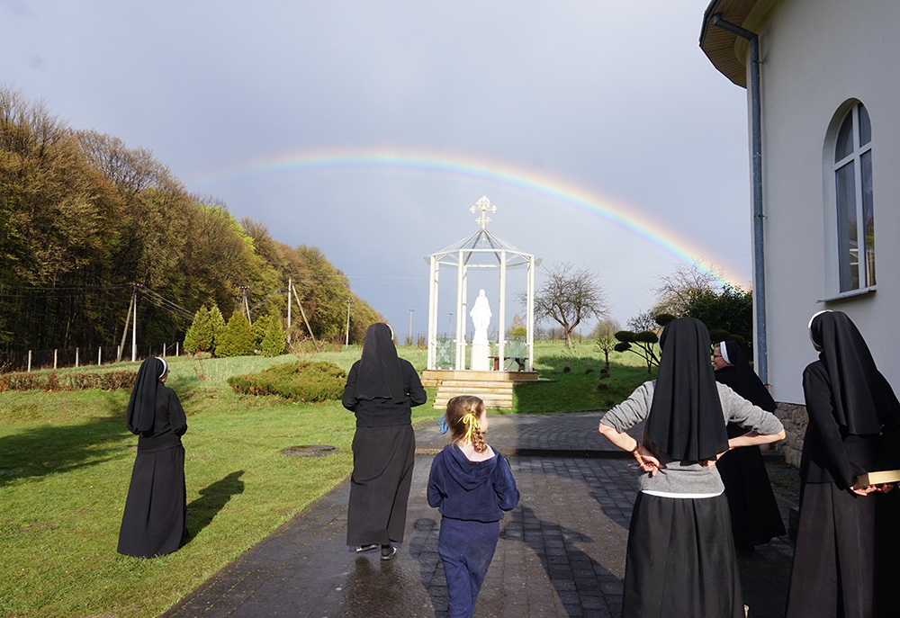 On April 25, 2022, the first day after Easter, a rainbow appears over the house where the Basilian sisters were sheltering about 30 refugees at the Transfiguration Monastery in Beregy in the Lviv region of Ukraine. (Courtesy of Sisters of the Order of St. Basil the Great)