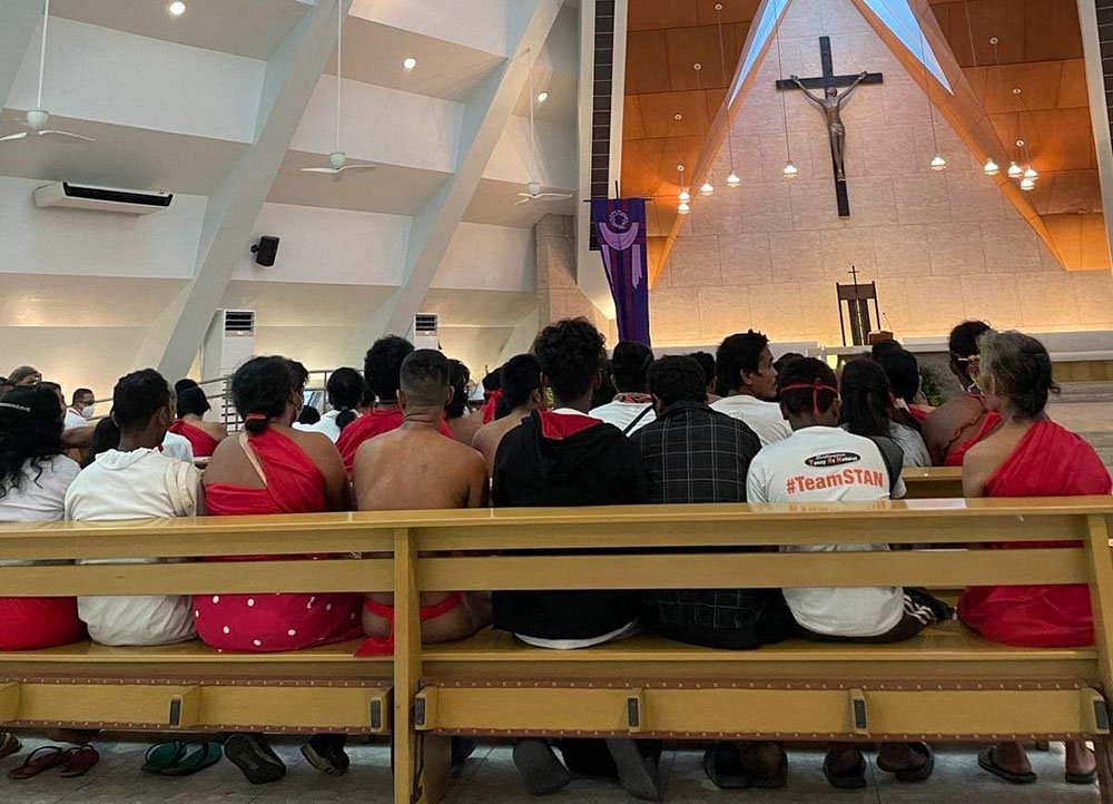 Indigenous marchers attend Mass Feb. 23 in the Church of the Gesu at the Jesuit-run Ateneo de Manila University in the Philippines. (Karina Bolasco)