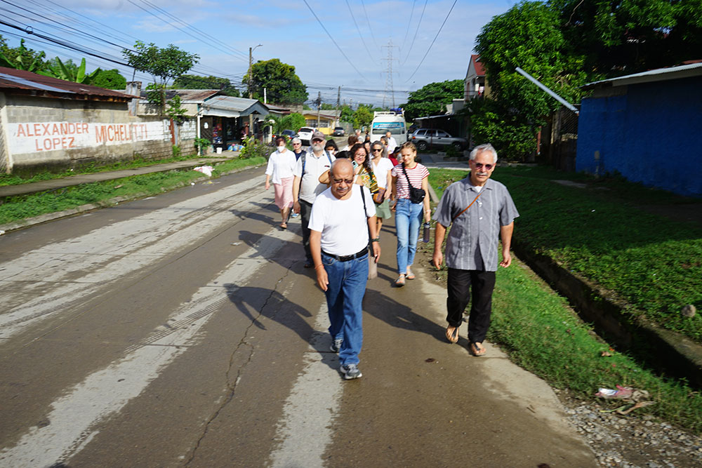 Members of the delegation walk to church for Mass on Dec. 11, 2022. (SHARE Foundation/Mark Coplan)