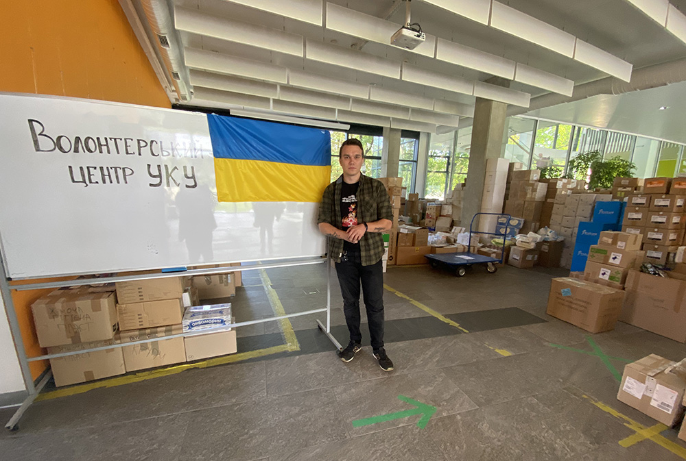 Ostap Machynskyy, 25, head of the rector's office at the Ukrainian Catholic University, shows donations he's collected Sept. 2, 2022, on the college's main campus in Lviv, Ukraine. Machynskyy helped set up an improvised volunteer center at the college to collect gauze, over-the-counter medicine, tourniquets, anything that might come in handy if the war escalates. (Rhina Guidos) 