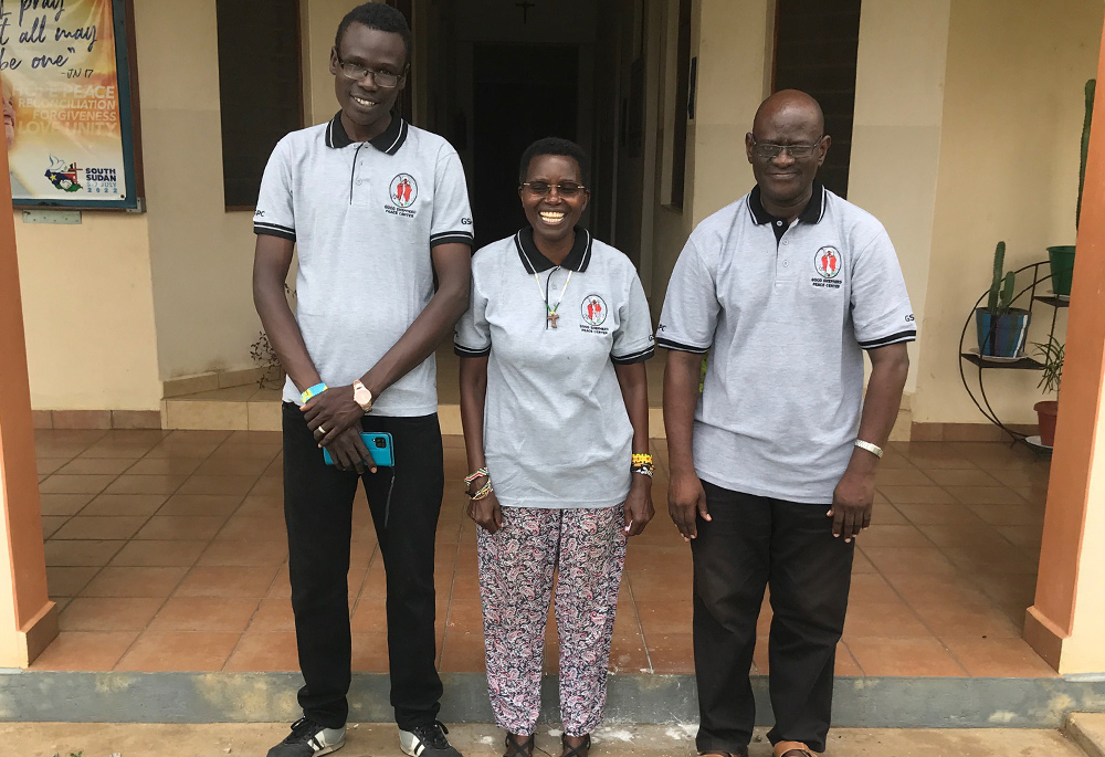 Sr. Scholasticah Nganda is pictured with two staff members of the Good Shepherd Peace Centre-Kit, a few miles south of Juba, in South Sudan. Nganda writes about how she and her colleagues try to keep hope alive in a country in turmoil and conflict. (Courtesy of Scholasticah Nganda)