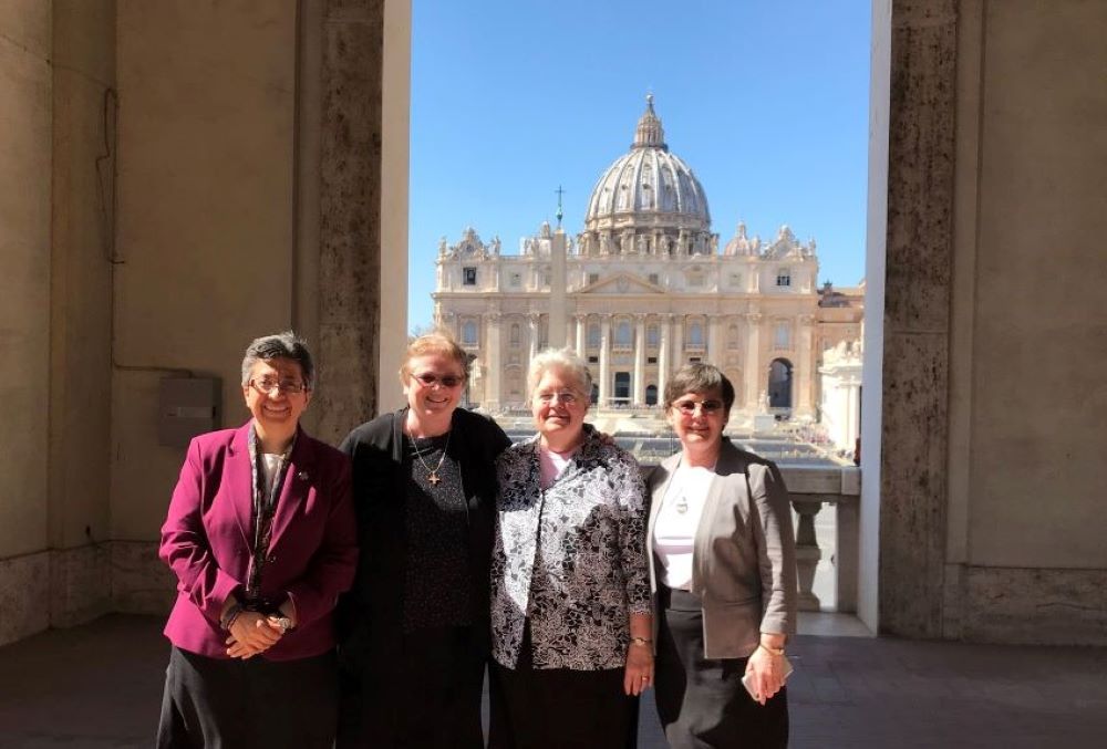 Leadership Conference of Women Religious leaders stand on the balcony of a Vatican office that overlooks St. Peter’s Square during the 2019 LCWR annual visit.