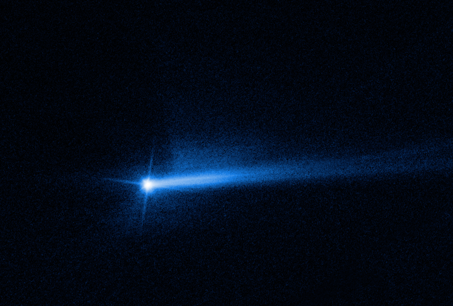 Two tails of dust ejected from the Didymos-Dimorphos asteroid system are seen in this Oct. 20 image from NASA's Hubble Space Telescope, documenting the lingering aftermath of the Sept. 26 planetary defense test.