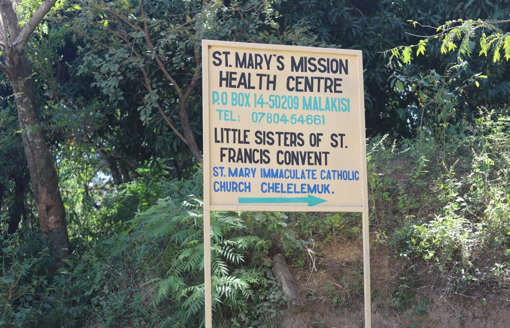 Sign promotes church and health center.