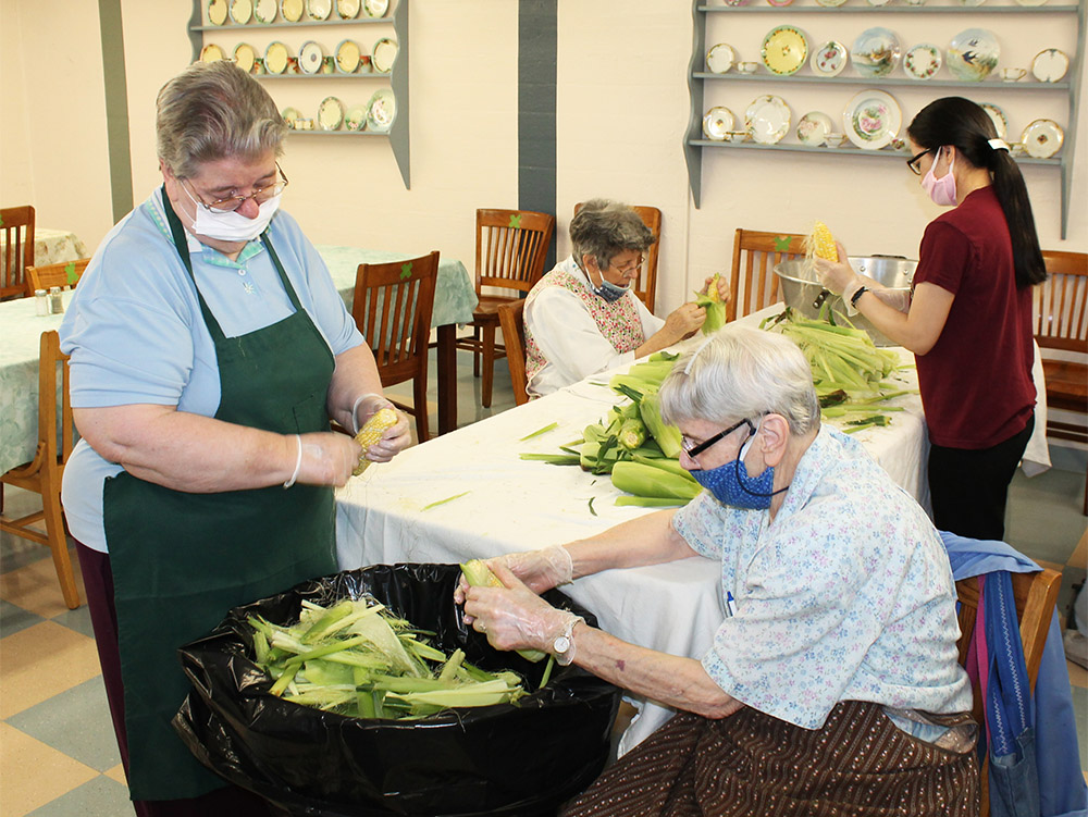 Most of the sisters pitch in when there are apples to peel or corn to shuck! (Courtesy of Ursuline Sisters of Mount St. Joseph)