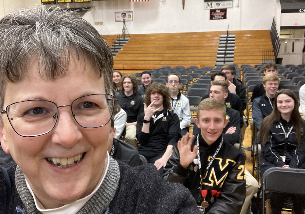 Springfield Dominican Sr. Beth Murphy poses for a selfie with students at the congregation's Marion Catholic High School in Chicago Heights, Illinois, during a recent school celebration of Catholic sisters. (Courtesy of Beth Murphy)