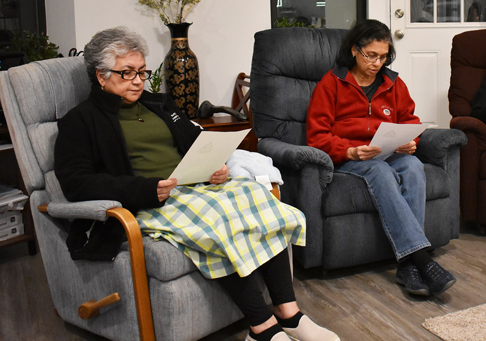 Novice Alba Luz Mejia Solis, left, and Sr. Corinna Thomas participate in Evening Prayer at the InterCongregational Collaborative Novitiate in Chicago. (Julie A. Ferraro)