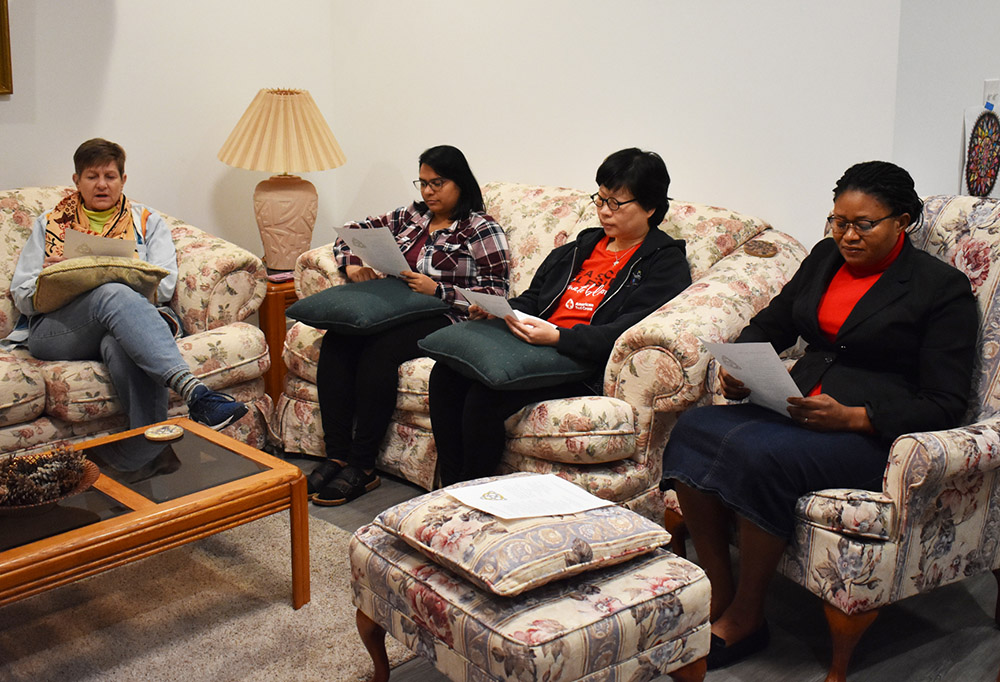 Sr. Nancy Gerth, left, participates in evening prayer at the InterCongregational Collaborative Novitiate with novices Maribah Ishaq, Maisie Ng and Juliana Wuur. (Julie A. Ferraro)