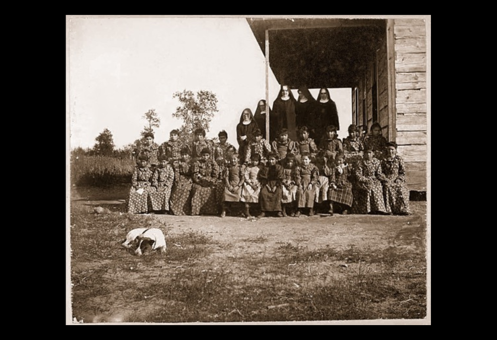 Sisters and students at Red Lake Indian school 1889 ("Sisters and students at Red Lake mission school," College of Saint Benedict/Saint John's University Libraries, https://csbsjulib.omeka.net/items/show/919)