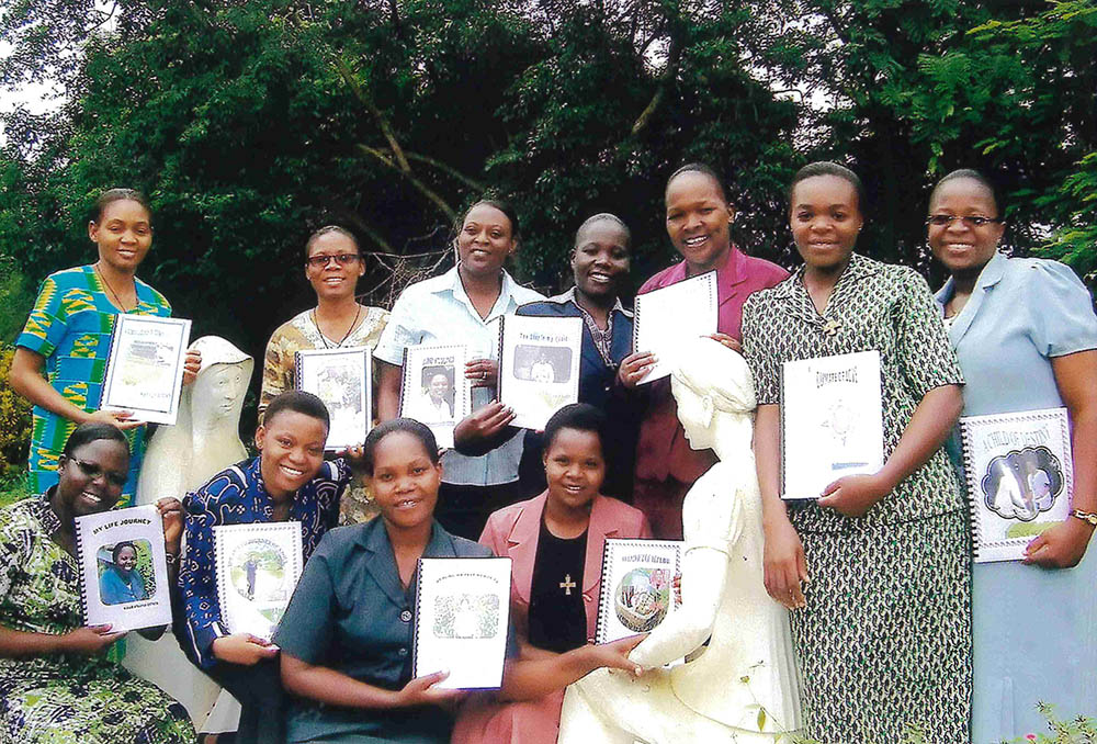 School Sisters of Notre Dame novices pose with their memoirs in Sunyani, Ghana. (Courtesy of Kathleen Feeley) 