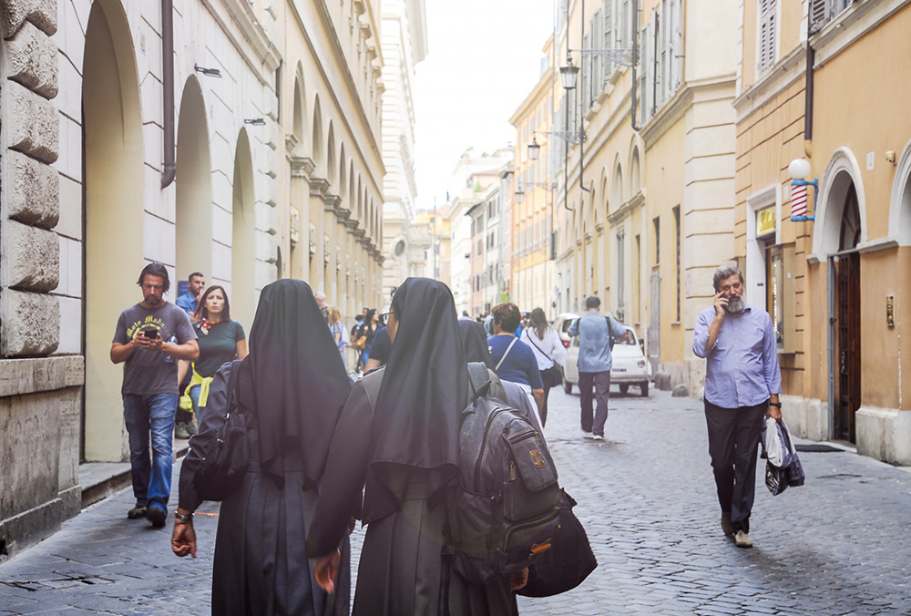 Nuns are seen walking down a street in Rome in an undated photo. (Dreamstime/Davide Zanin)