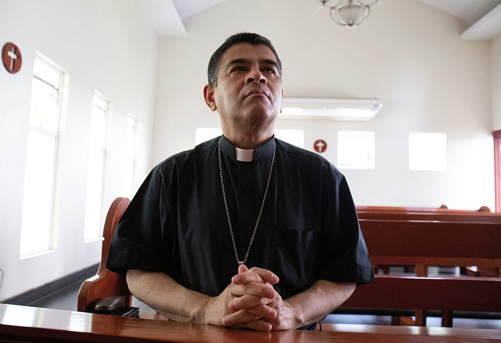 Bishop Rolando Álvarez of Matagalpa, Nicaragua, a frequent critic of Nicaraguan President Daniel Ortega, prays at a Catholic church May 20, 2022, in Managua. A Nicaraguan court sentenced Álvarez to more than 26 years in prison Feb. 10 for conspiracy and spreading false information. (OSV News photo/Reuters/Maynor Valenzuela)