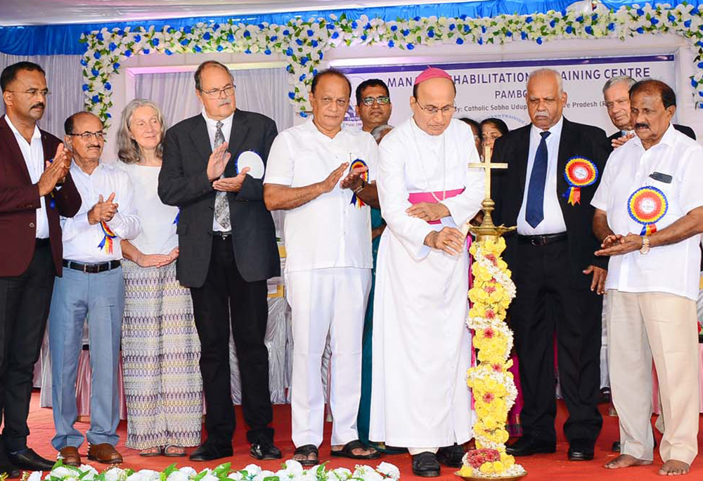 Bishop Gerald Isaac Lobo of Udupi inaugurates the silver jubilee celebrations of the Manasa Rehabilitation and Training Centre in Pamboor on Nov 14, 2022. The center's managing trustees, principal and lay leaders join him on the dais. (Courtesy of Ancilla Fernandes)