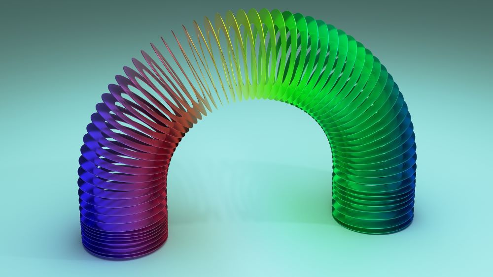 a Slinky is stretched into a half moon shape