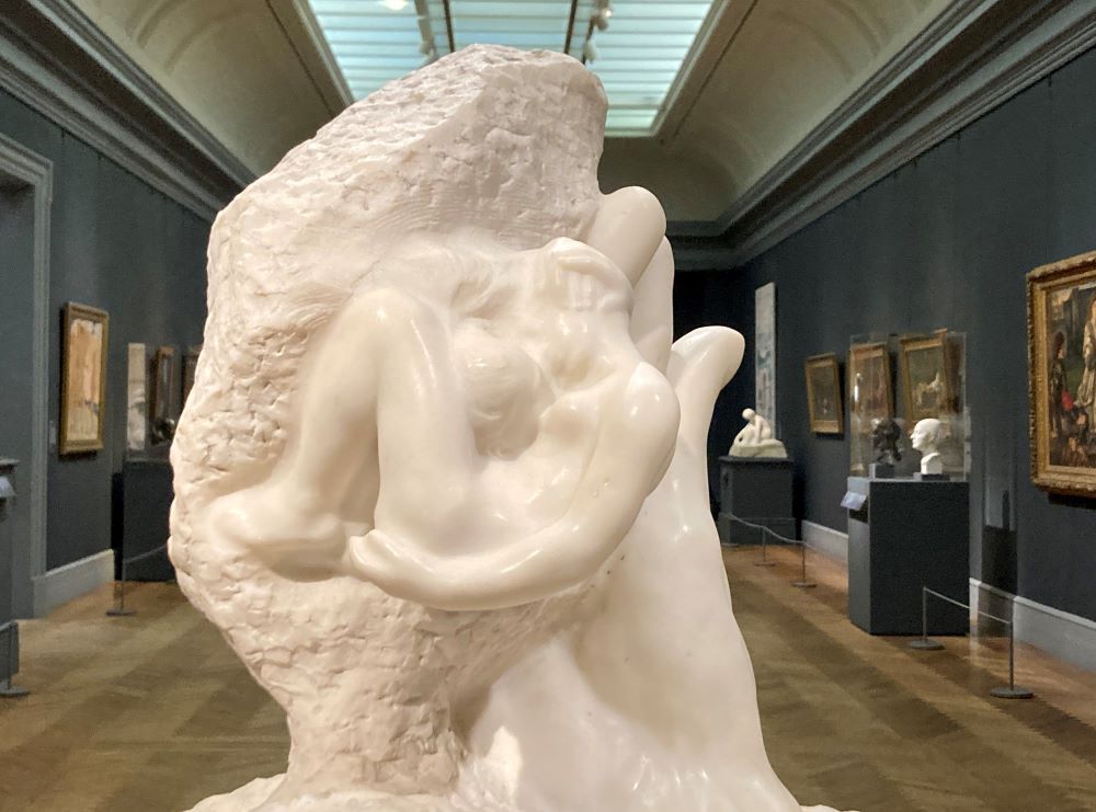 White marble sculpture The Hand of God by Rodin