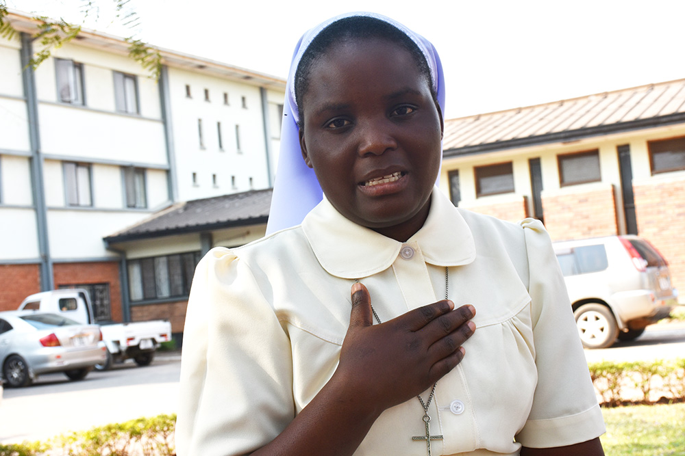 Sr. Christabel Kazembe, a Sister of Mercy in the Diocese of Mansa, Zambia, stresses a point during an interview at the Zambia Association of Sisters offices in Lusaka. She is the project manager for Strengthening the Capacity of Religious Women in Early Childhood Development (SCORE-ECD) in Zambia, which runs early childhood development programs, including teaching parenting skills to mothers. (GSR photo/Derrick Silimina)