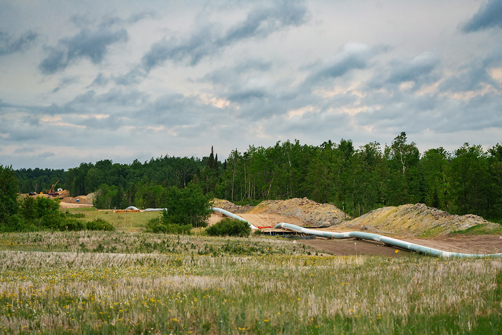 The Enbridge Line 3 oil pipeline construction is seen from County Road 48 near Portage Lake in Todd Township, Hubbard County, Minnesota, June 11, 2021. (Flickr/Tony Webster)