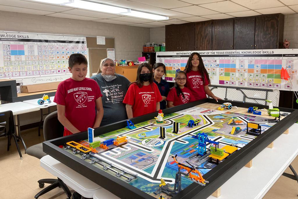 Teresian Sr. Mary Lou Aldape with students of her robotics club at Sacred Heart Catholic School in Uvalde, Texas (Courtesy of Mary Lou Aldape)