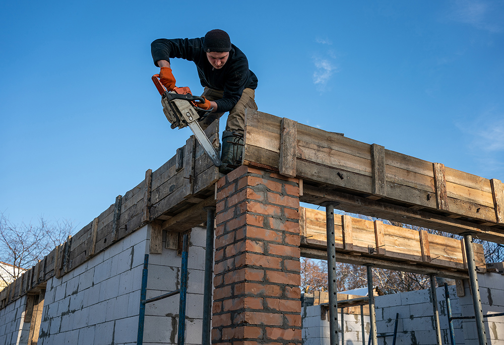 Despite the tragedy of the massacre of civilians in Bucha, Ukraine, as well as the destruction of property, families are reconstructing their homes — and, by inference, rebuilding their lives. (GSR photo/Chris Herlinger)