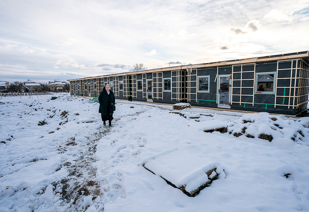 On a bitterly cold February afternoon, Dominican Sr. Edita Vozarova is seen during a visit to the nearby town of Serednje, where a project to expand housing for a group of displaced orphans and adults from the Russian-occupied city of Mariupol is under way. (GSR photo/Gregg Brekke)