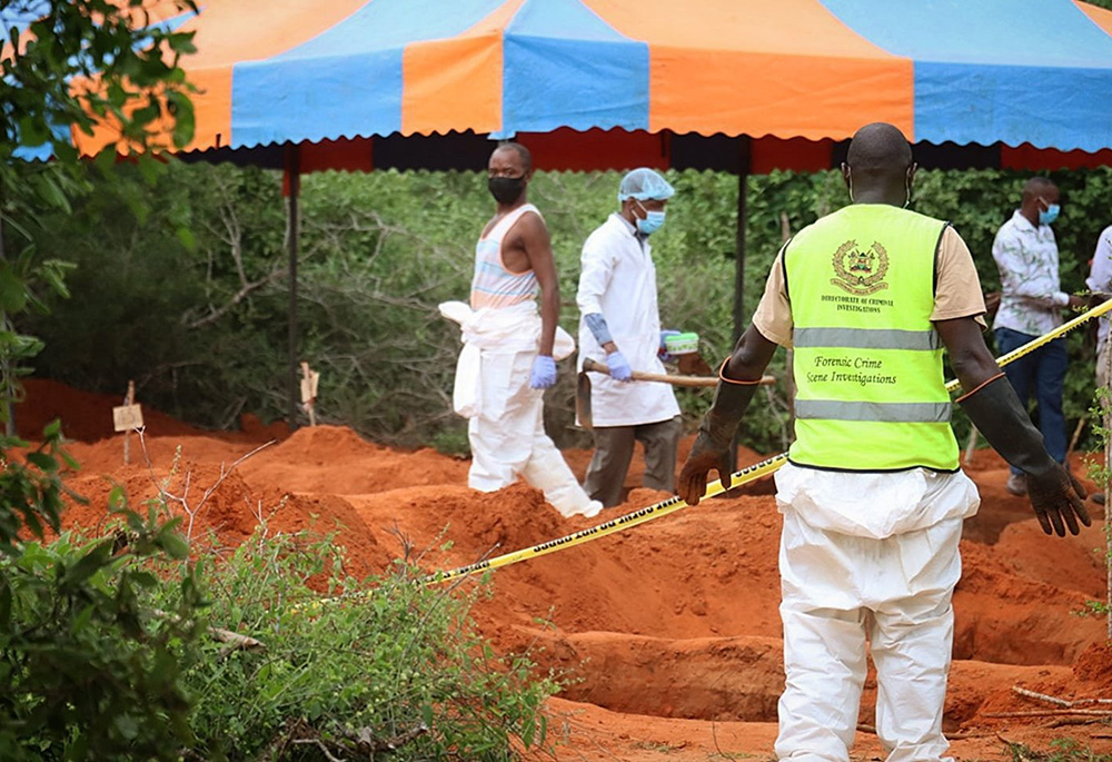 Kenyan authorities retrieve bodies from shallow graves in the 800-acre ranch in Kilifi County near the town of Malindi. As of May 1, the death toll was 110, according to The Associated Press. (OSV News/Courtesy of Sheshi Visual Arts/Moses Mpuria)
