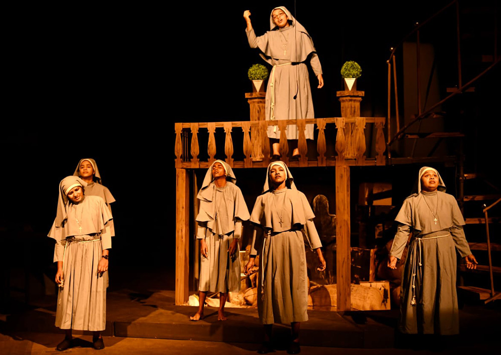 Actors play Catholic nuns in the controversial play "Kakkukali" at a theater in the southwestern Indian state of Kerala. The Catholic Church has demanded a ban on the play, saying it tarnishes the image of Catholic religious life. (Raneesh Raveendran)